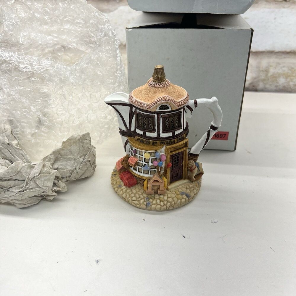 NIB Vintage- Hometown Teapot Cottages- Merry Go Round Toy Shop- 4”